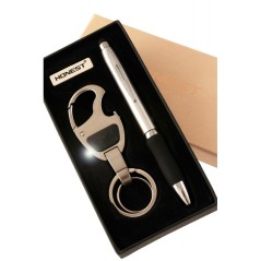 Estuche con bolígrafo y llavero abrebotellas/linterna metálico color gun...