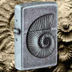 ESPECTACULAR ZIPPO RELIEVE METAL AMONITA ERA MESOZOICA MADE U.S.A